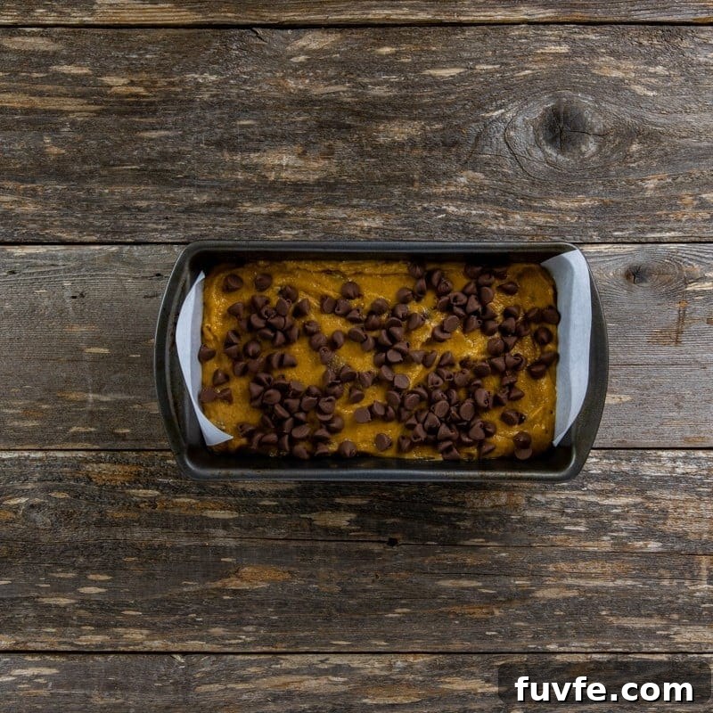 Baked pumpkin loaf still in the loaf pan.