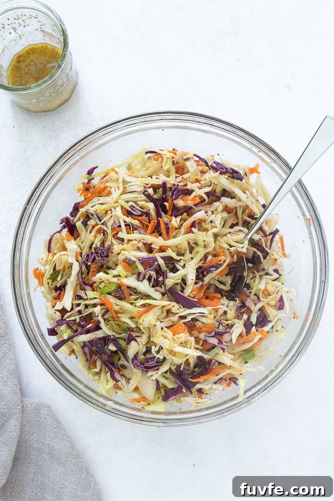 No mayo coleslaw dressing in a glass bowl
