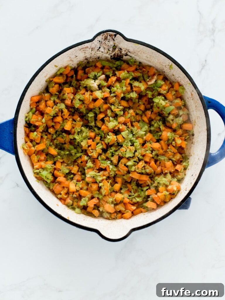Creamy Chicken and Wild Rice Soup Recipe for Comforting Weeknights 6 sautéed vegetables in a skillet