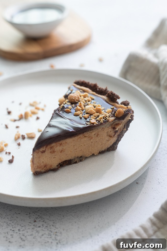 Slice of chocolate peanut butter pie on a plate