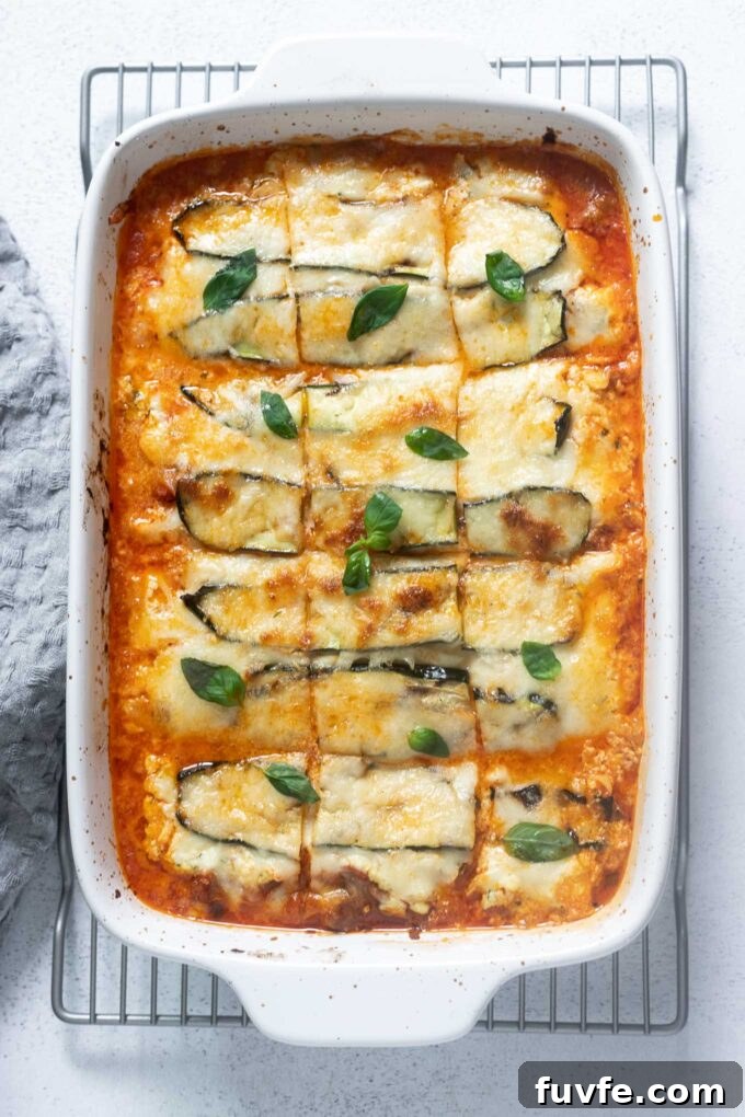 Zucchini lasagna in a baking dish cut into squares