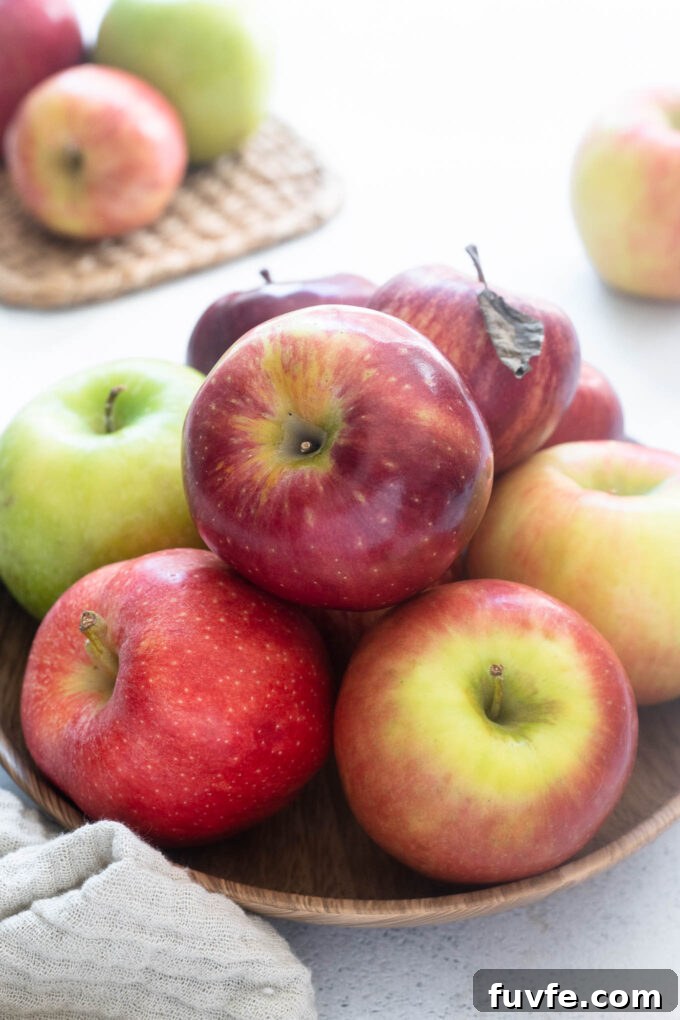 45 Apple Recipes with Complete Produce Guide 3 Apples in a bowl