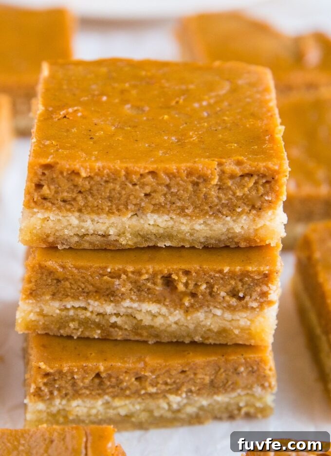 Stack of paleo pumpkin pie bars.