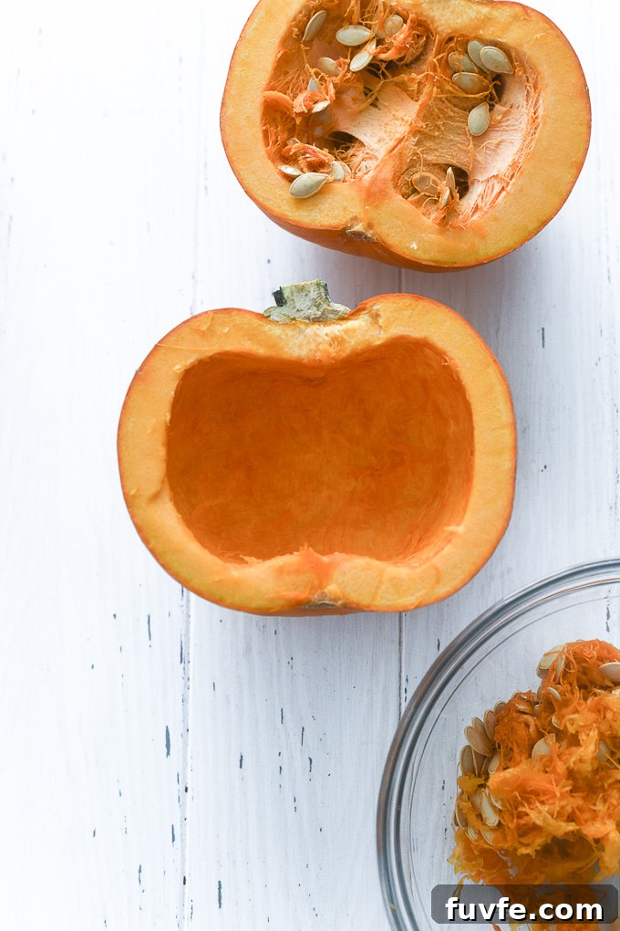 How to Cut a Pumpkin for Carving and Cooking 3 Halved pumpkin with seeds removed