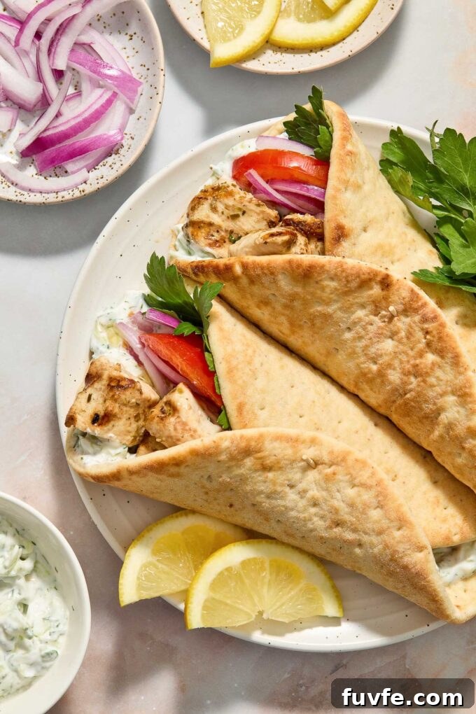 Authentic Greek Chicken Souvlaki Recipe with Tzatziki 6 Souvlaki chicken in pita bread.