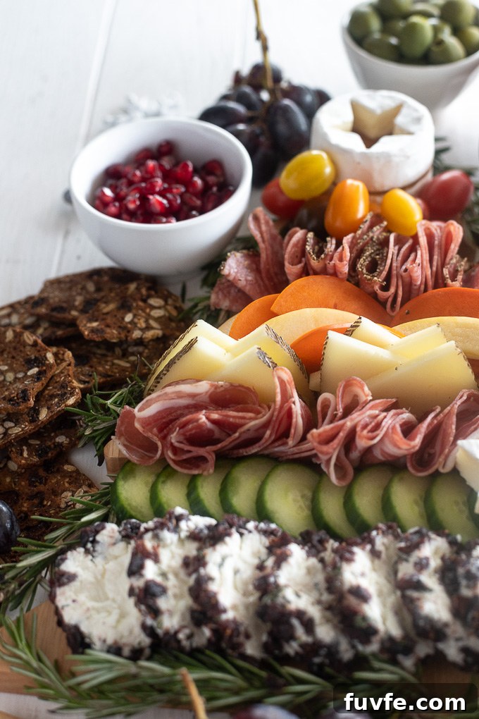 Christmas charcuterie board with manchego, pomegranate and more