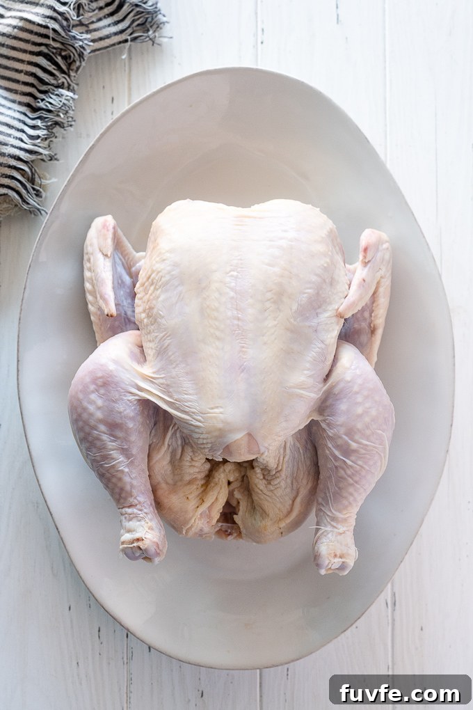 How to Cut Up a Whole Chicken: Step-by-Step Guide 3 Whole chicken on a platter
