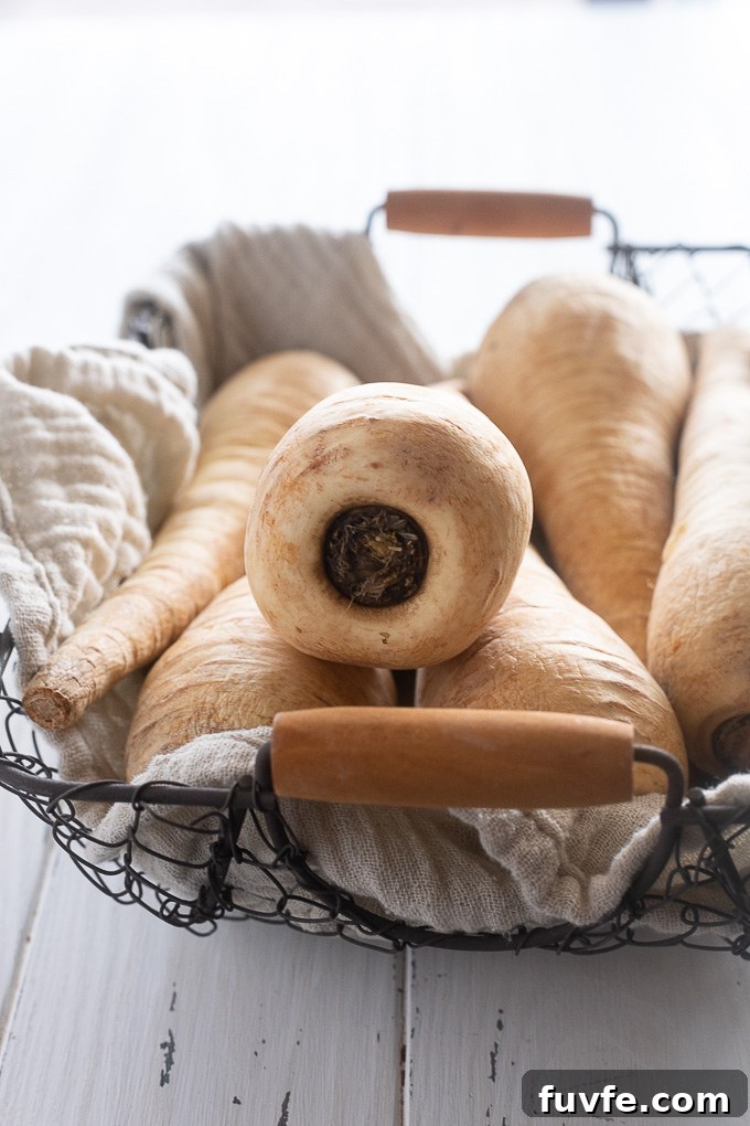 Parsnip Recipes: Cooking, Storage and Produce Guide 3 Parsnips in a basket lined with a linen