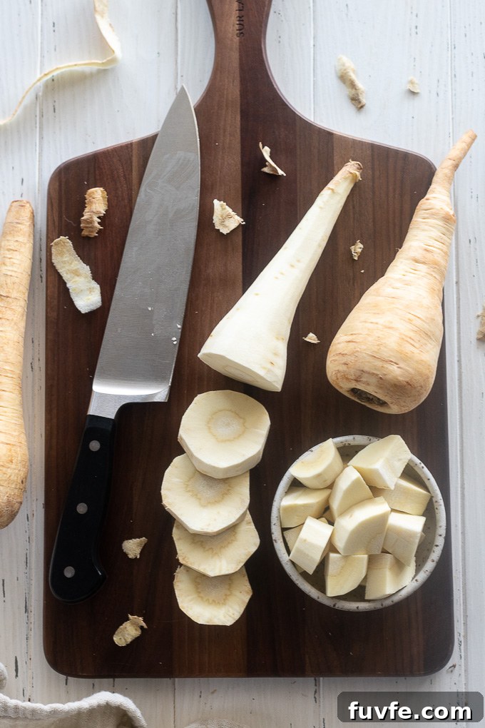 Parsnip Recipes: Cooking, Storage and Produce Guide 5 Sliced and chopped parsnips on a cutting board