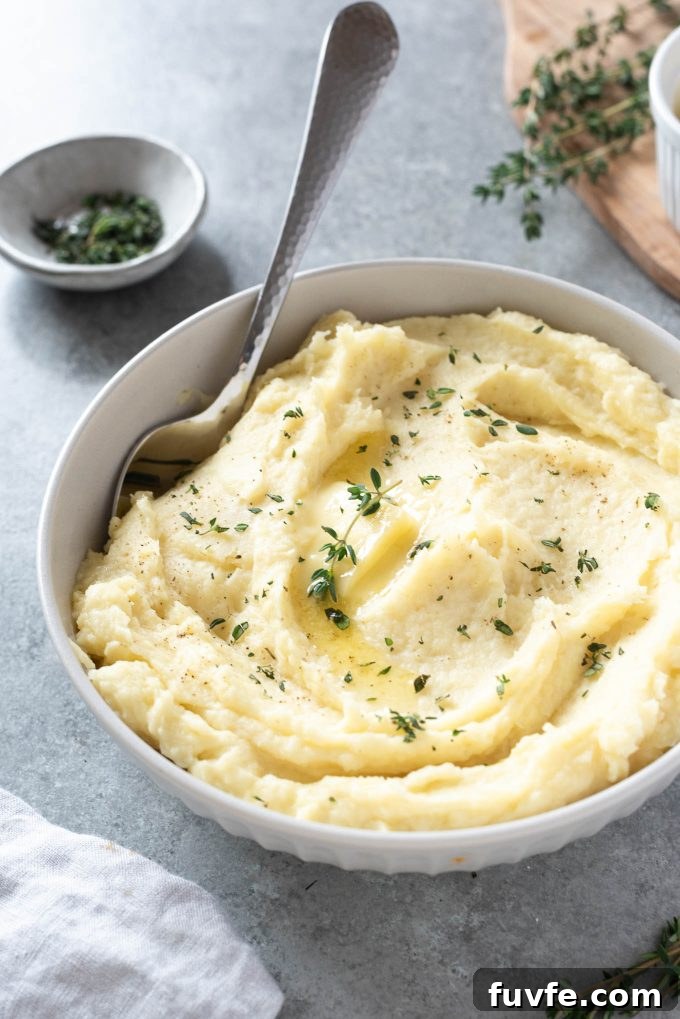 Parsnip Recipes: Cooking, Storage and Produce Guide 9 Parsnip puree in a white bowl with serving spoon digging in