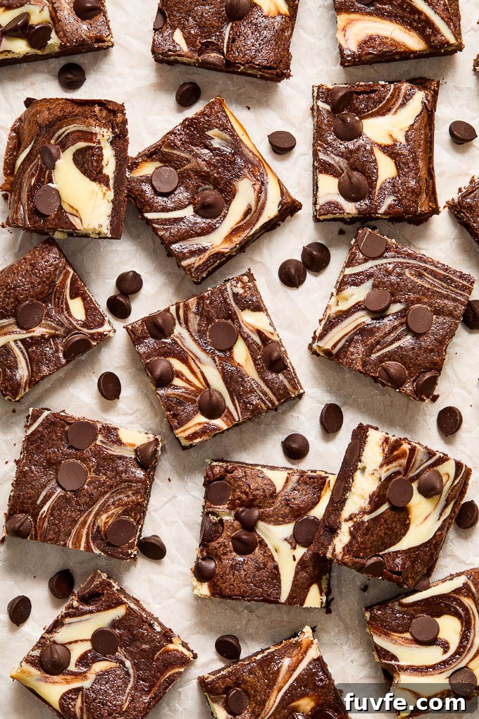 Cheesecake swirl brownies with chocolate chips scattered between them