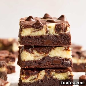 Stack of cheesecake brownies.