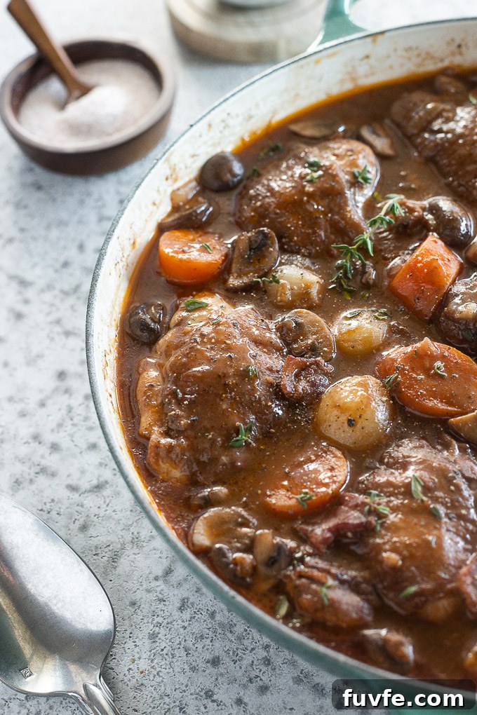Classic Coq au Vin Recipe: French Red Wine Braised Chicken 3 Coq au vin with chicken thighs, mushrooms and pearl onions