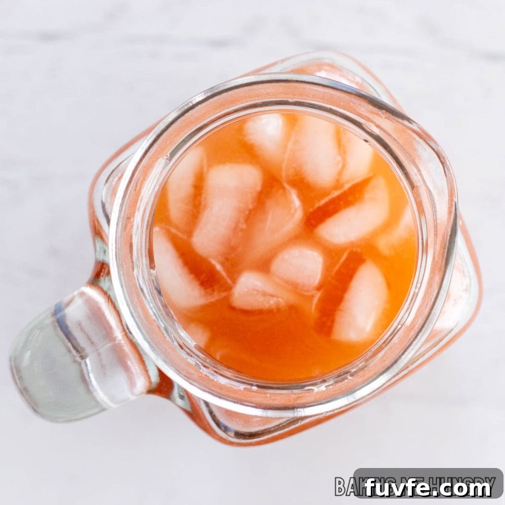 overhead shot of a pitcher of the guava white tea lemonade