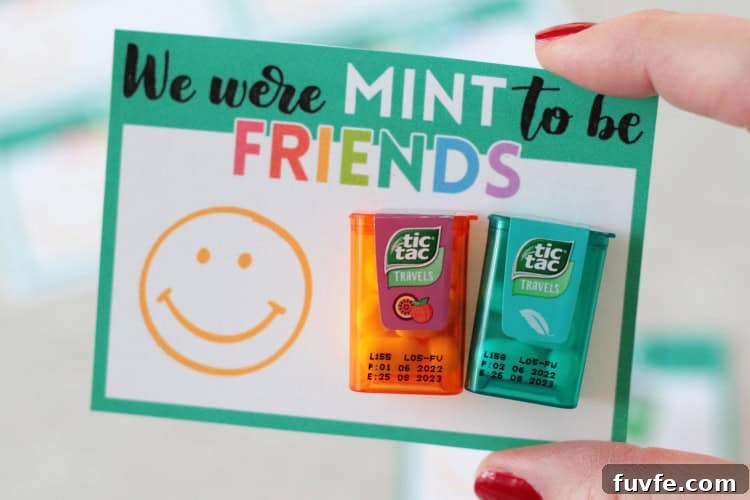 hand holding "we were mint to be friends" valentine card