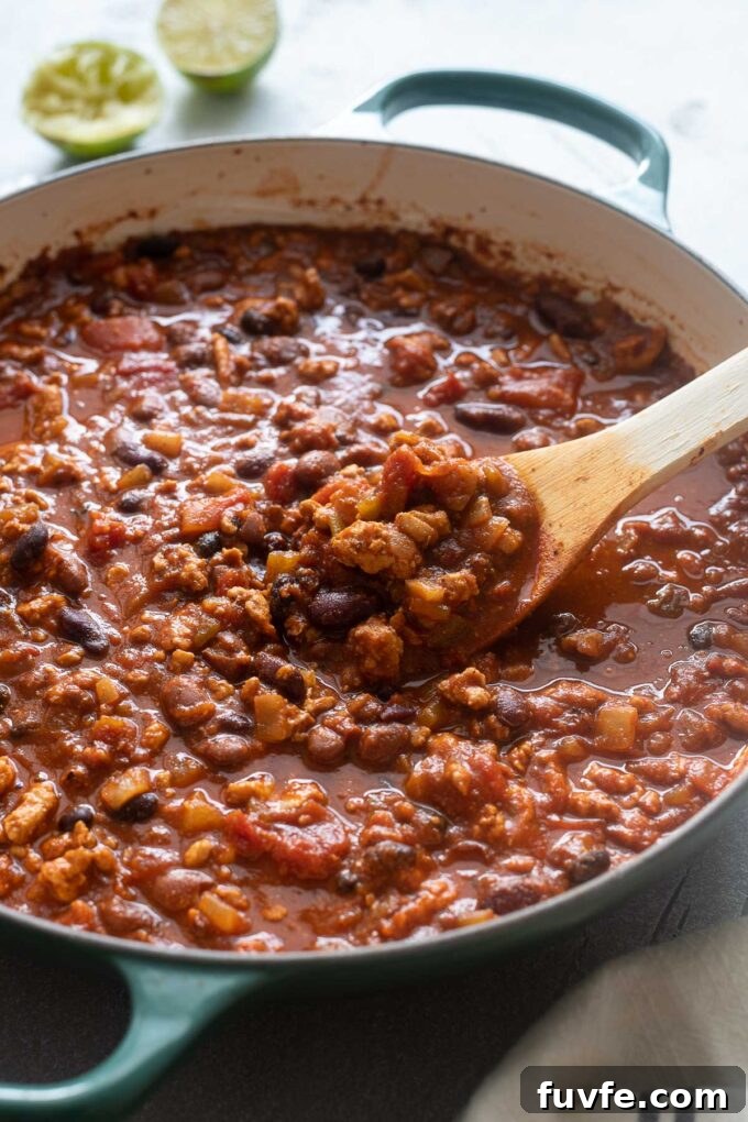 Chicken chili with ground chicken in a dutch oven.