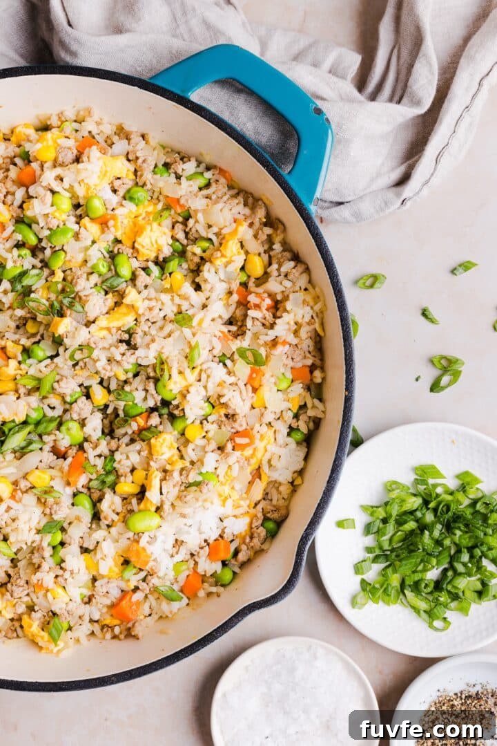 Savory Ground Turkey Fried Rice Recipe — Quick Weeknight Meal 3 Close-up shot of turkey fried rice prepared in a pan