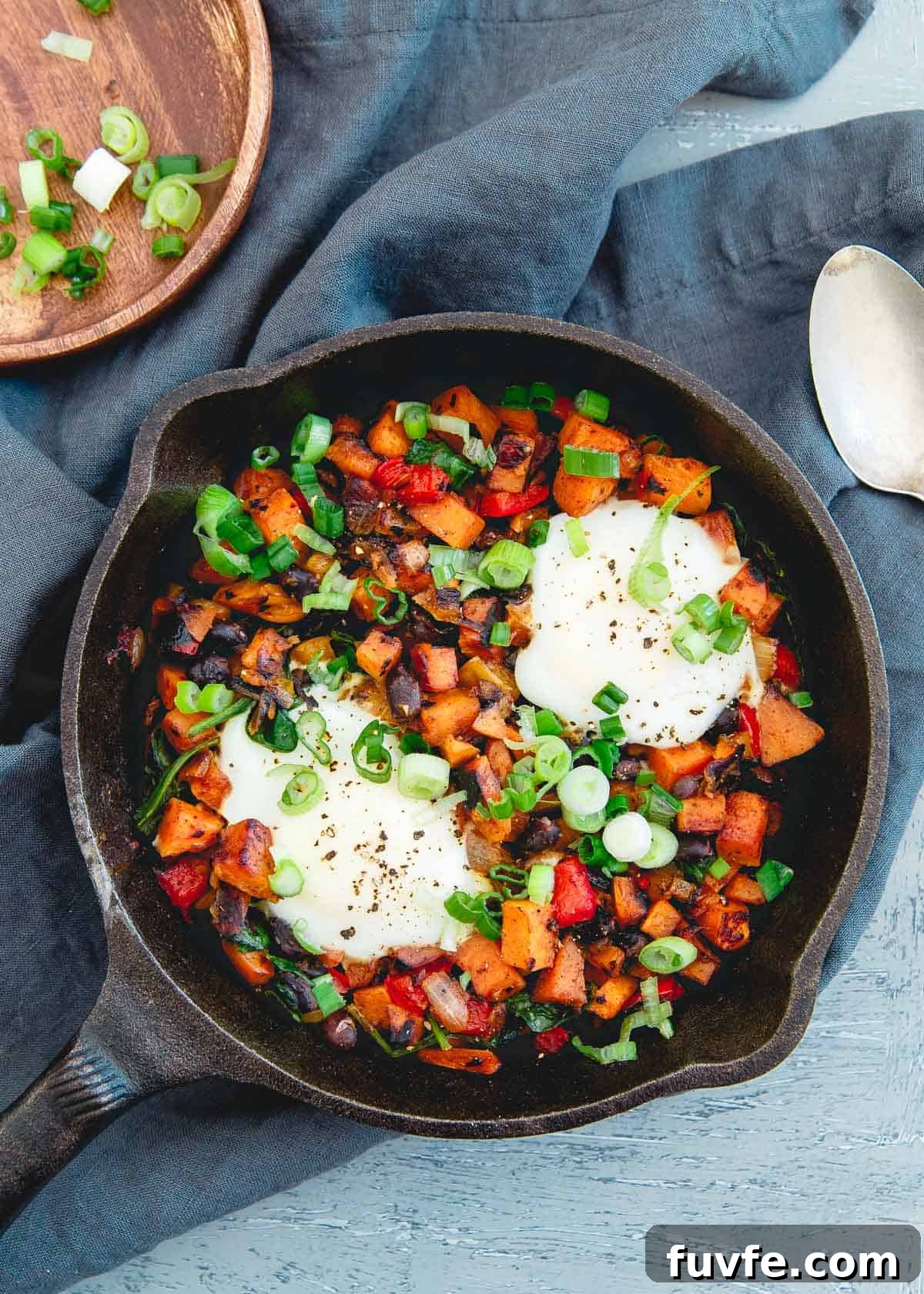 This is a quick Mexican inspired sweet potato hash with a spicy harissa kick. Super simple and makes the perfect breakfast, lunch or dinner!