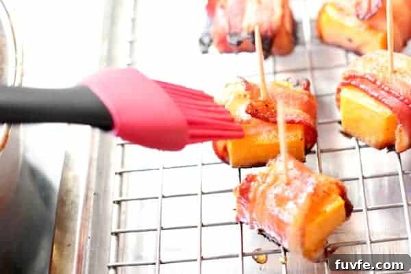 Bacon-Wrapped Butternut Squash Bites: Crispy Savory Appetizers 6 glazed bacon wrapped butternut bites