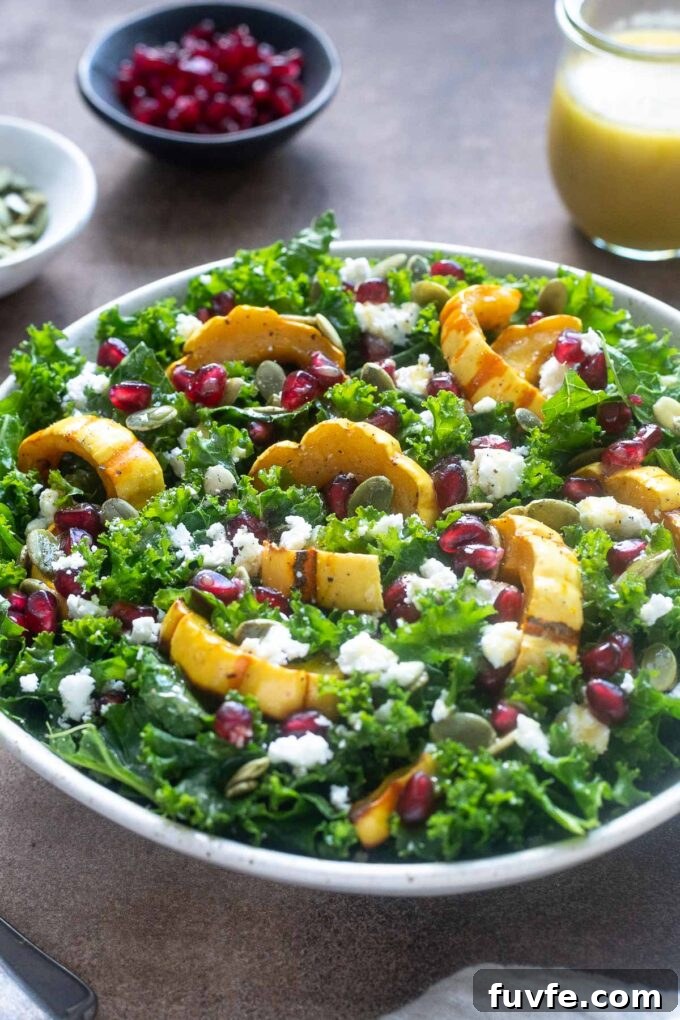 Roasted delicata squash salad with kale and feta cheese.