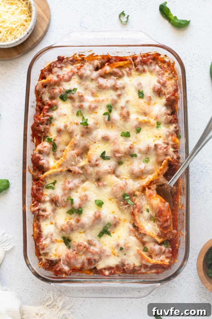 Beef and ricotta stuffed shells in baking dish.