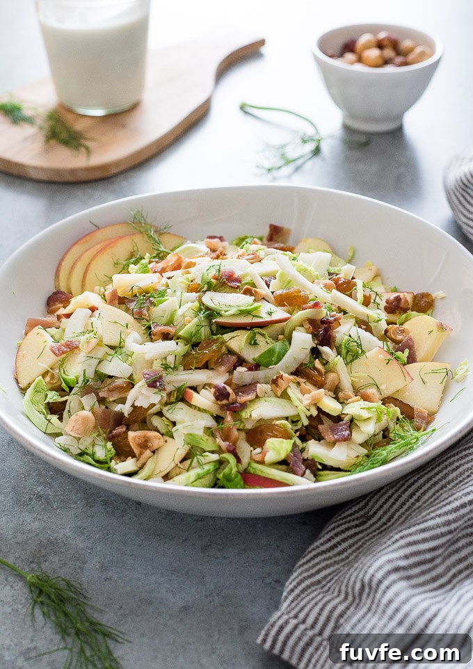 Brussels sprout slaw ingredients in a bowl