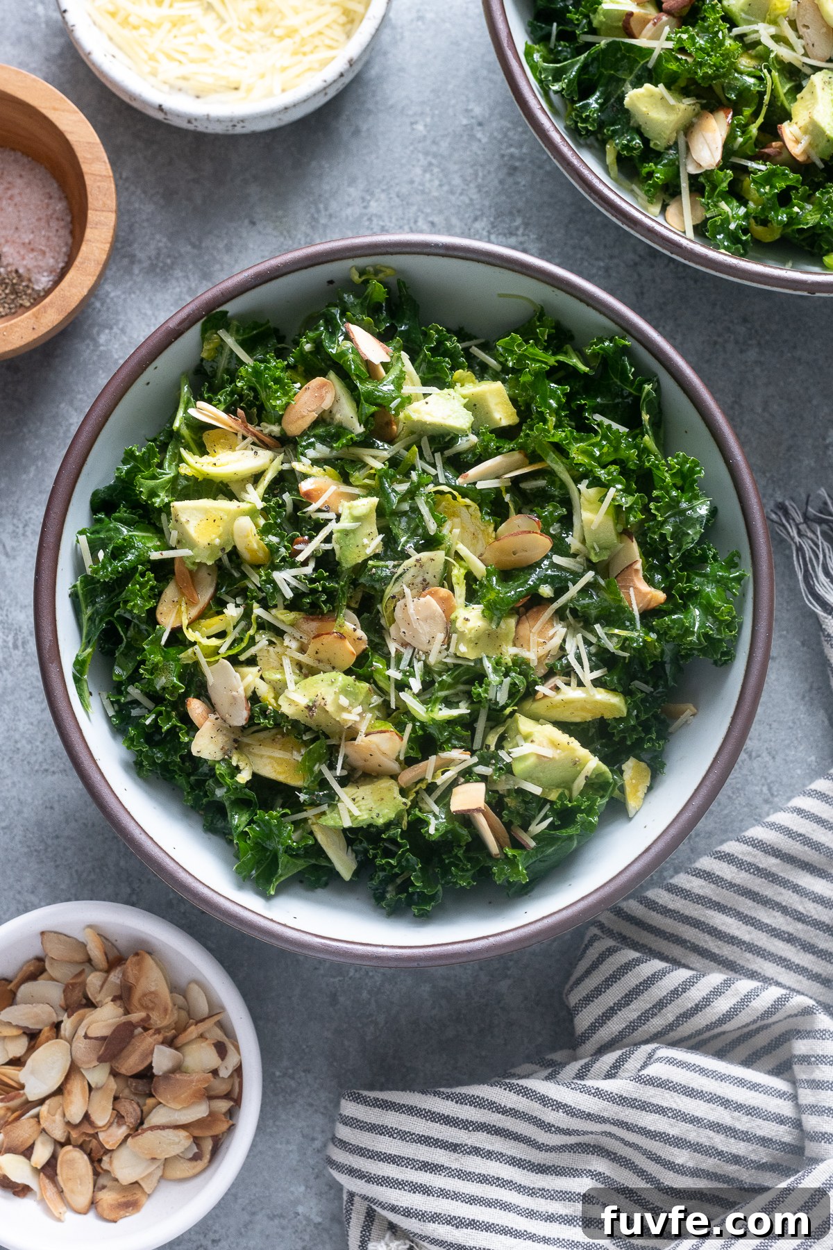 What's In Season in March: Fresh Produce Guide 19 Kale salad with shaved brussels sprouts and avocado in a bowl.