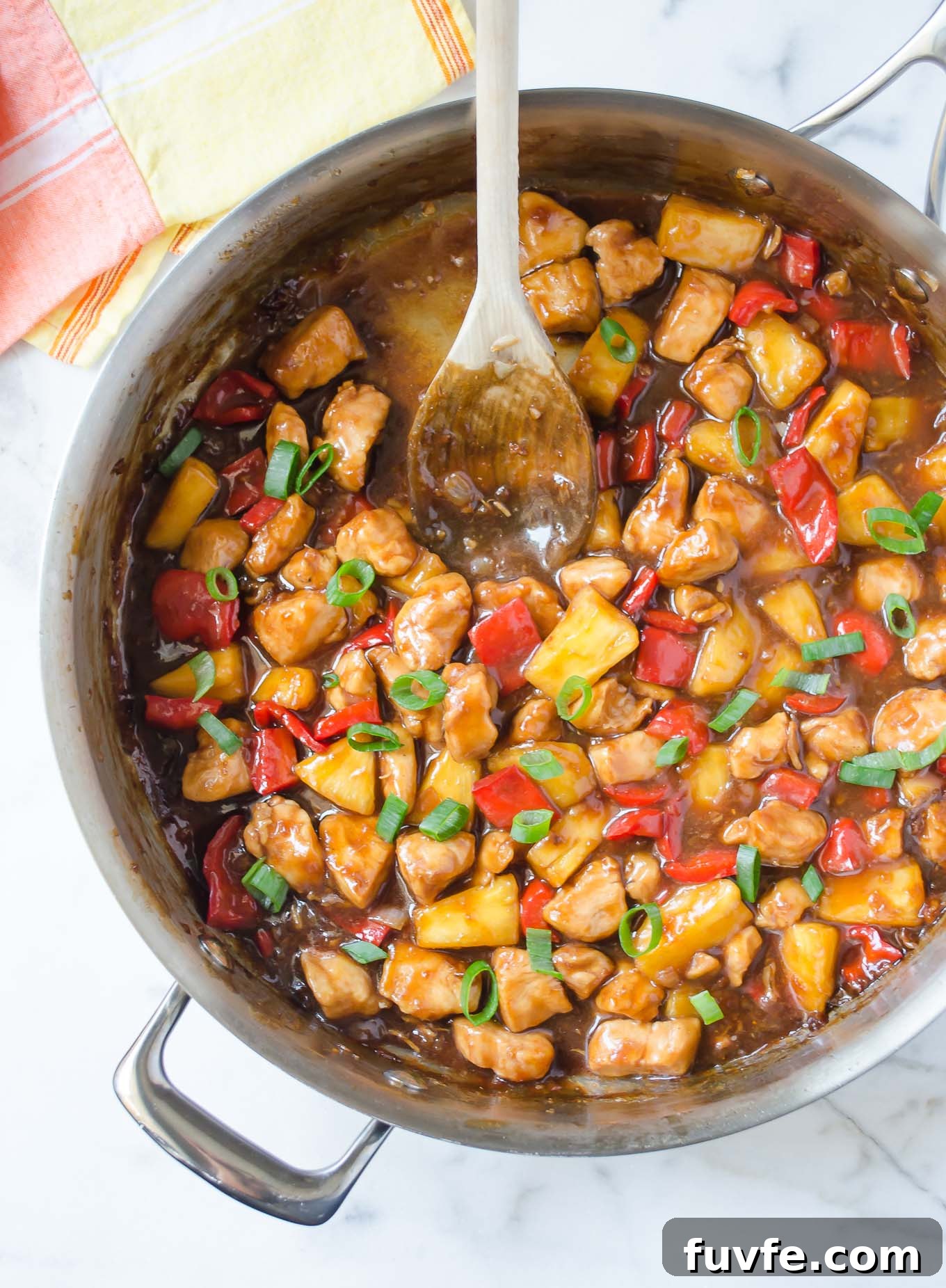 What's In Season in March: Fresh Produce Guide 45 Pan of honey pineapple chicken teriyaki with a wooden spoon
