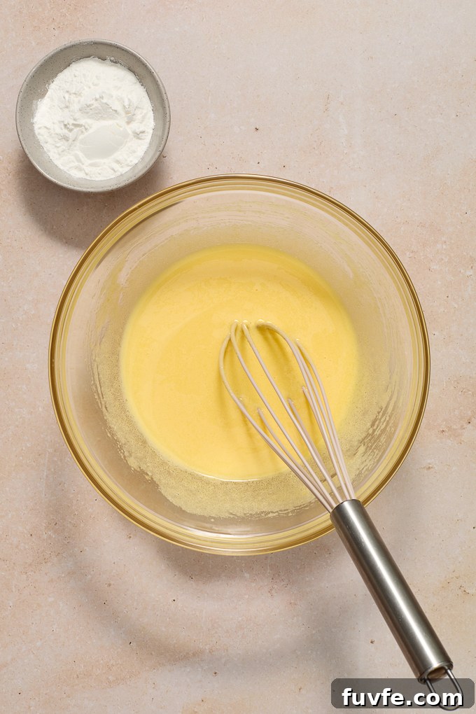 Silky Pastry Cream (Crème Pâtissière) Recipe 5 Whisked egg yolks and sugar for pastry cream.