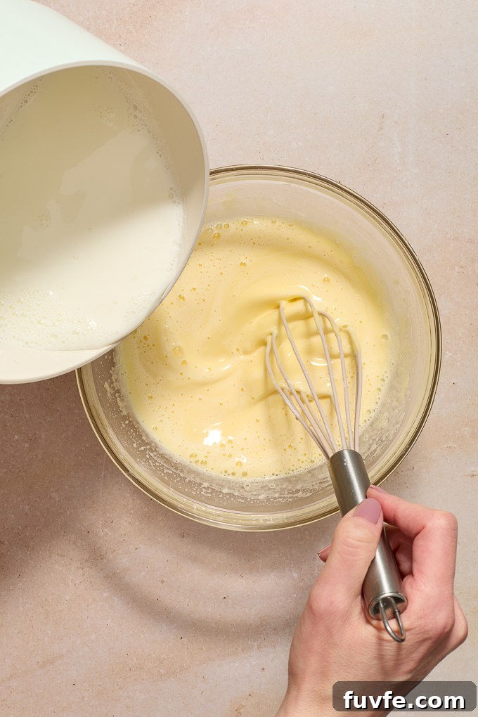 Silky Pastry Cream (Crème Pâtissière) Recipe 8 Milk whisked into pastry cream to temper eggs.