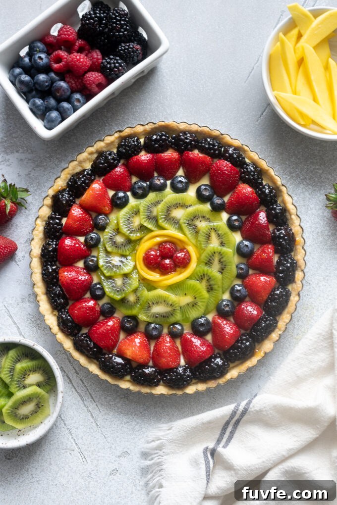 Classic French fruit tart glazed with apricot jelly.
