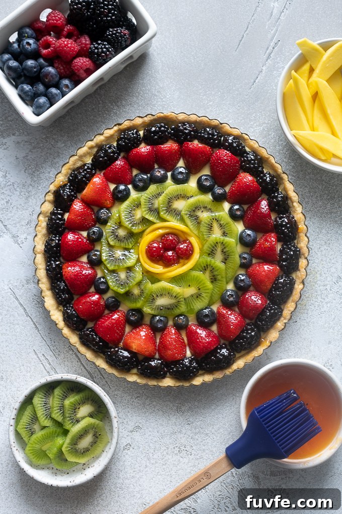 Glossy fruit tart glazed with apricot jelly.