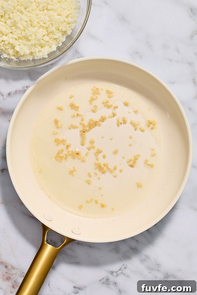 Cooked garlic in skillet.