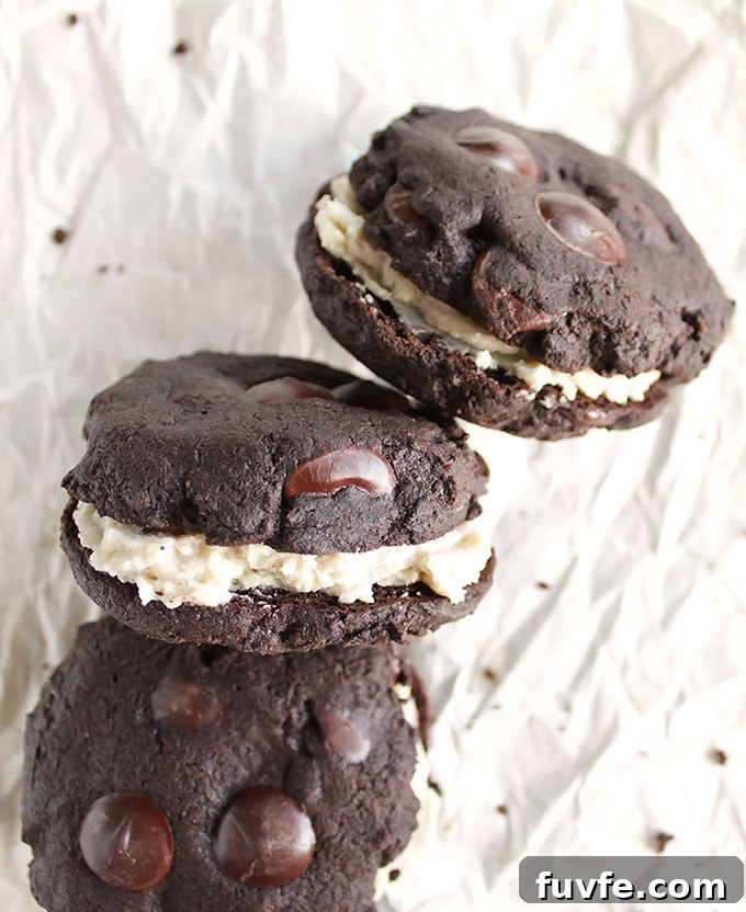 Homemade Gluten Free Oreos - Soft chocolate cookies filled with rich, creamy frosting. This recipe uses wholesome ingredients! Perfect for holiday baking! Dairy Free/Refined Sugar Free/Gluten Free | robustrecipes.com