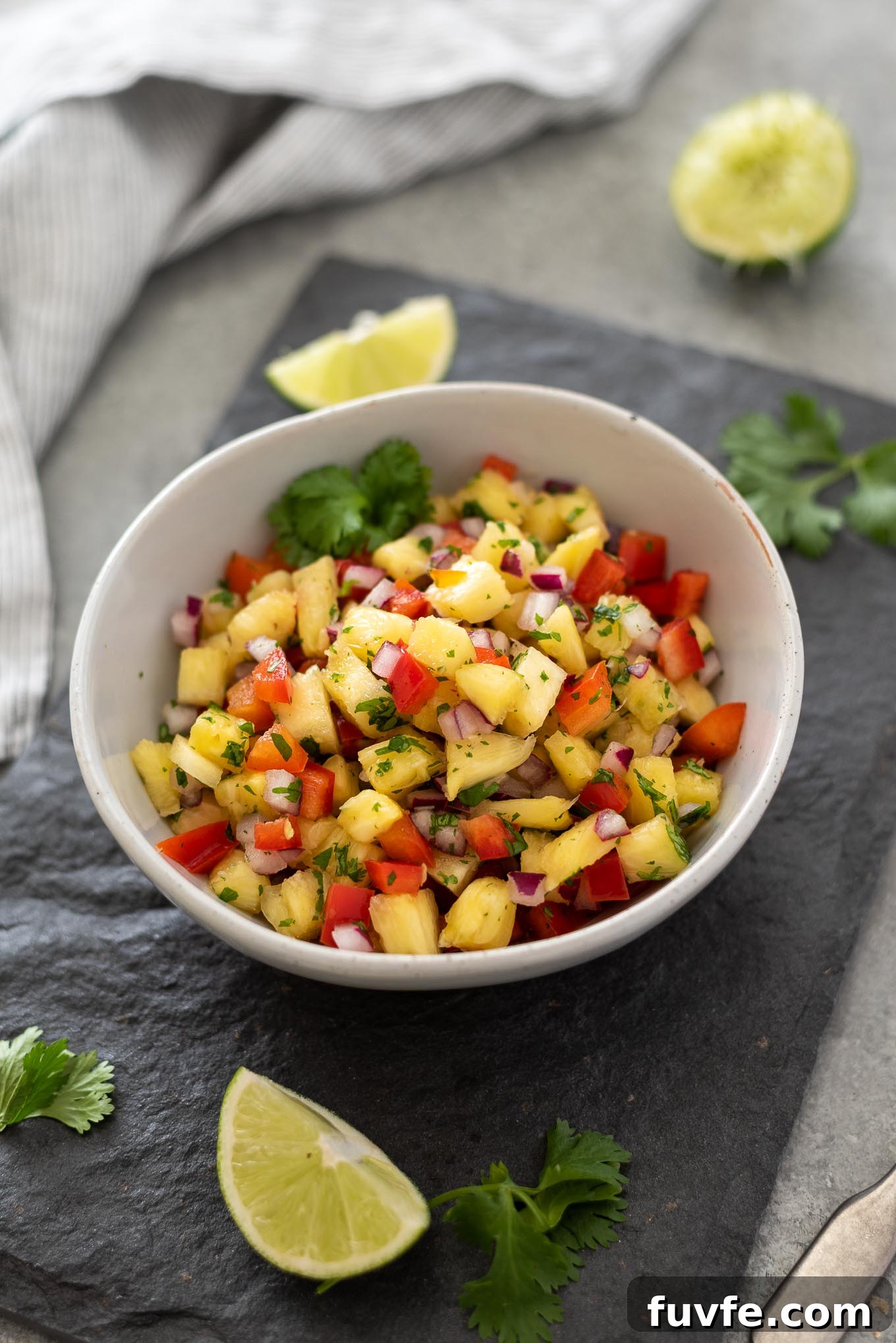 Pineapple salsa in a white bowl