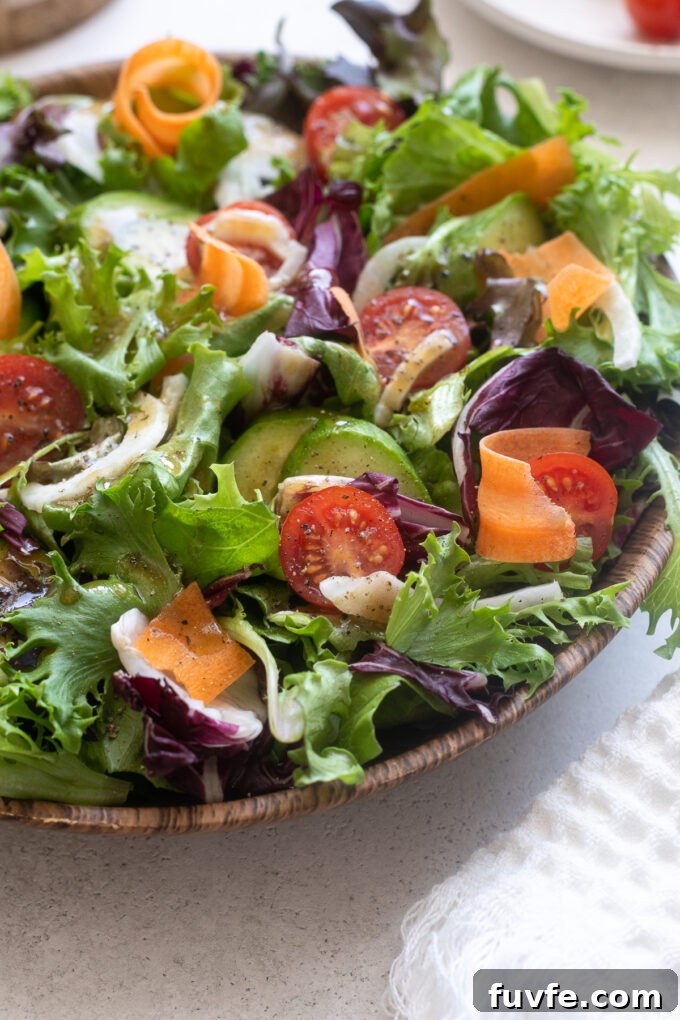 Italian green salad with fennel, tomatoes and balsamic dressing.