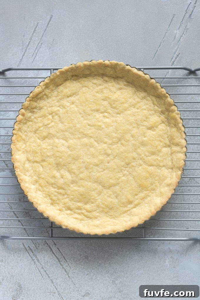 Press in tart dough in tart pan on wire rack.