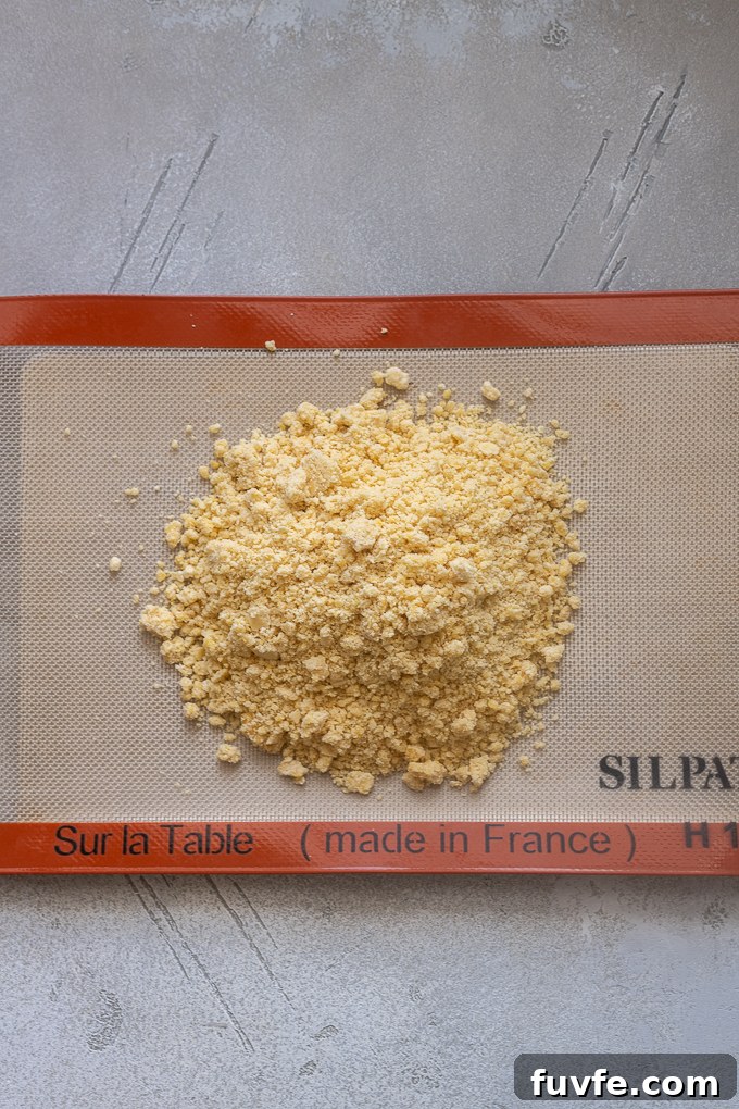 Sweet tart dough on Silpat mat before kneading.