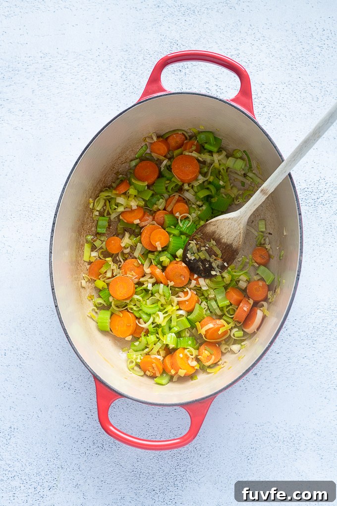 Spring Vegetable Soup Recipe with Asparagus, Peas and Mint 5 Cooked aromatics for spring vegetable soup.