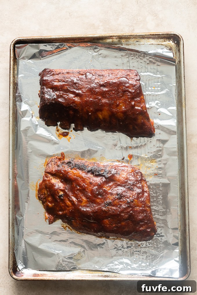 Fall-Off-the-Bone Slow-Cooker Baby Back Ribs 9 Caramelized barbecue baby back ribs after broiling.