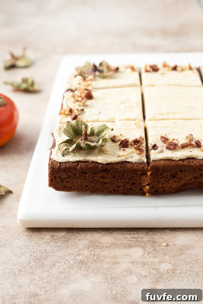 Close up of persimmon cake on serving board