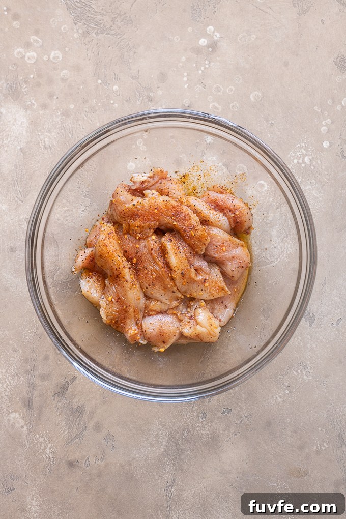 Air Fryer Chicken Fajitas Recipe: 20-Minute Dinner 5 Place the sliced chicken breast in a large bowl.