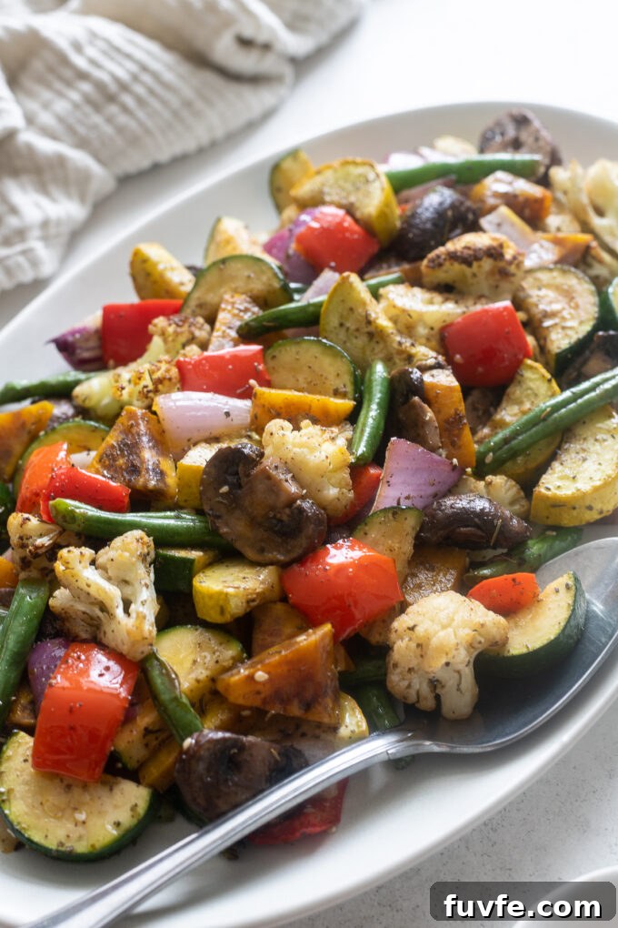Air fryer roast vegetables with za'atar spice on a platter.