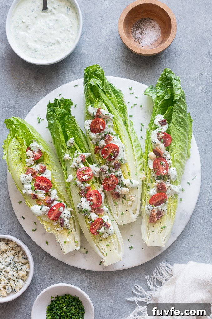 Assemble romaine wedge salads with goddess dressing.