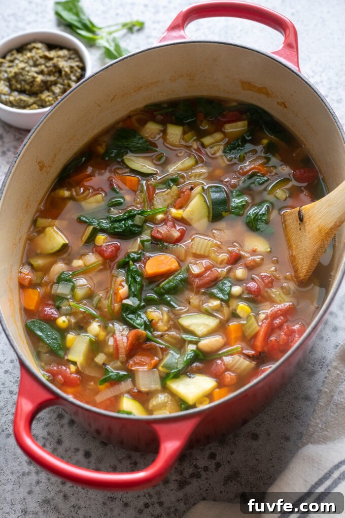 Summer vegetable soup in a Dutch oven.