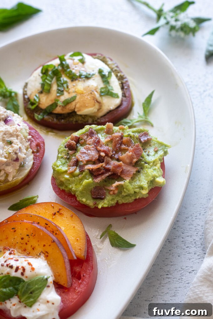 Heirloom tomato flight with avocado toast with bacon topping.