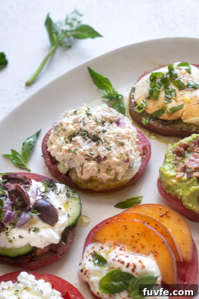 Heirloom tomato flight with tuna salad topping.