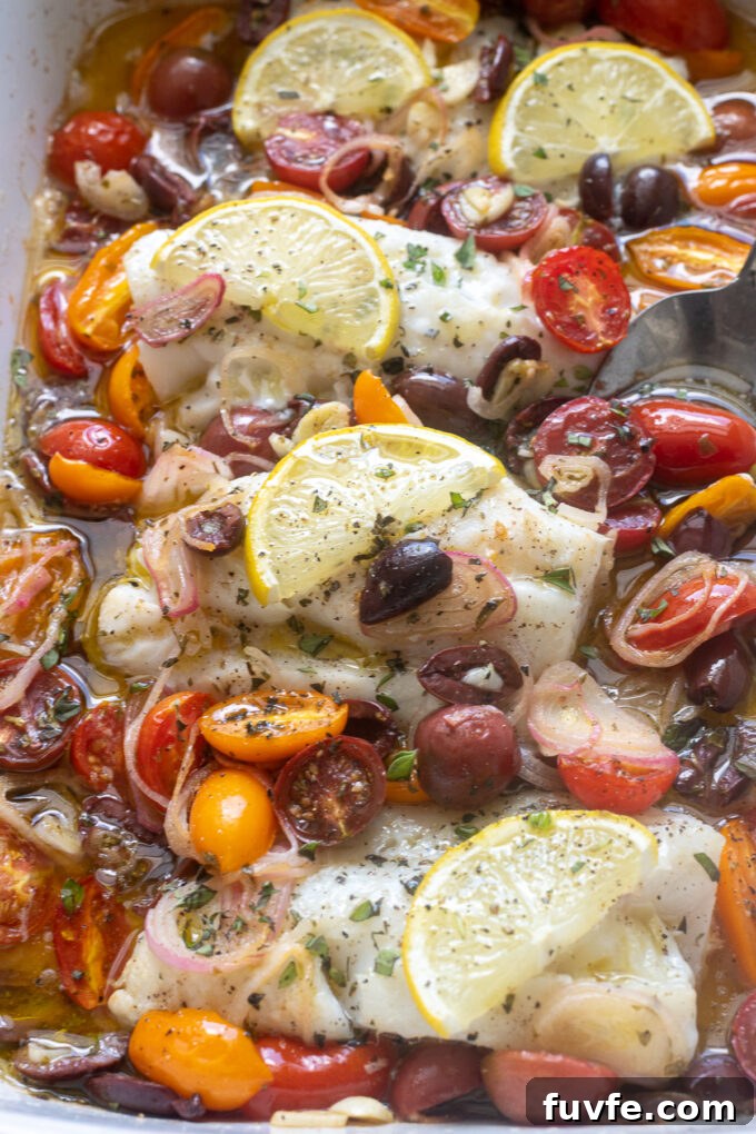 Mediterranean Baked Cod with Cherry Tomatoes, Olives and Lemon 9 Mediterranean baked cod fish with olive and tomatoes.