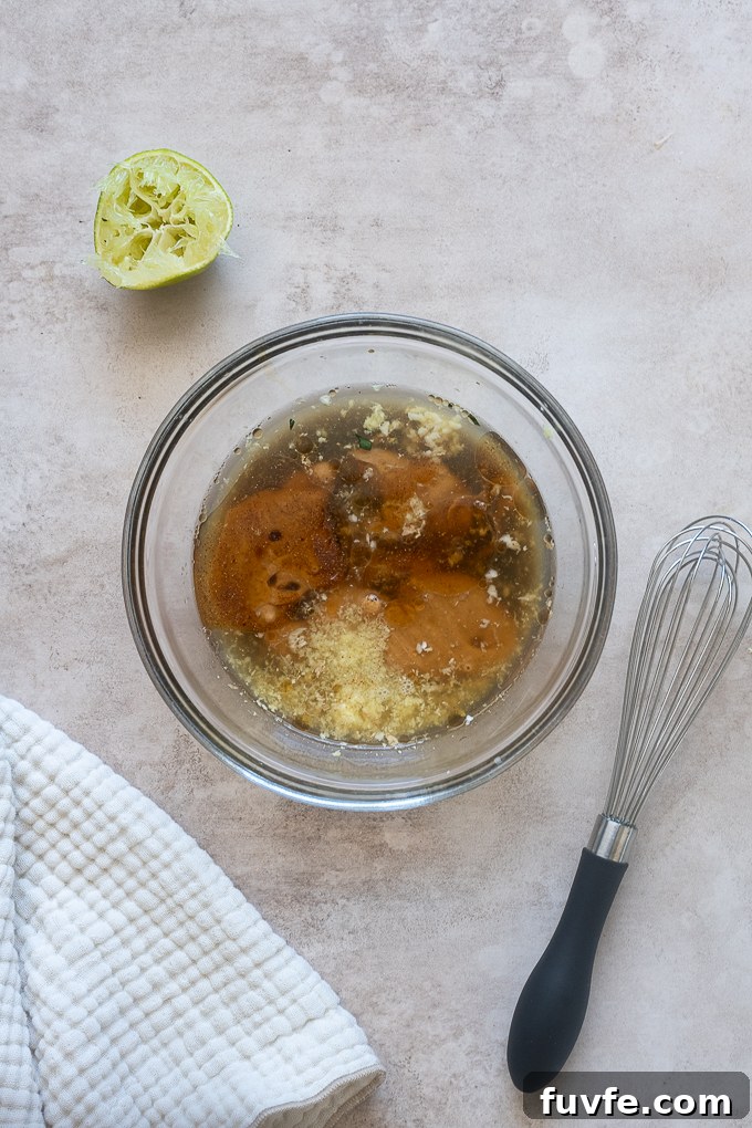 Peanut salad dressing ingredients in a bowl.