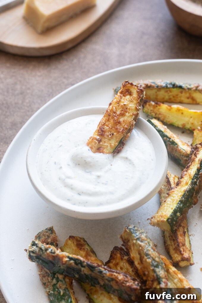Crispy Air Fryer Zucchini Fries 10 Air fryer zucchini fries with no breadcrumbs dipped in Greek yogurt ranch.